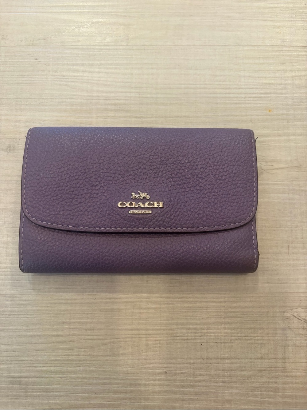 Coach Pebbled Leather Trifold Wallet in Plum
